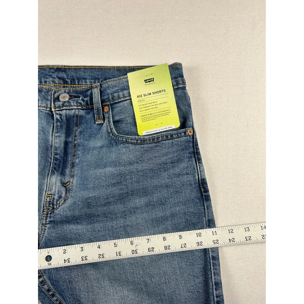 Levis 412 Slim Shorts Mens 34 Blue Denim Cut Off Raw Hem Performance Stretch NEW